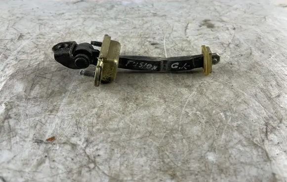 Ford Fusion Rear door check strap stopper