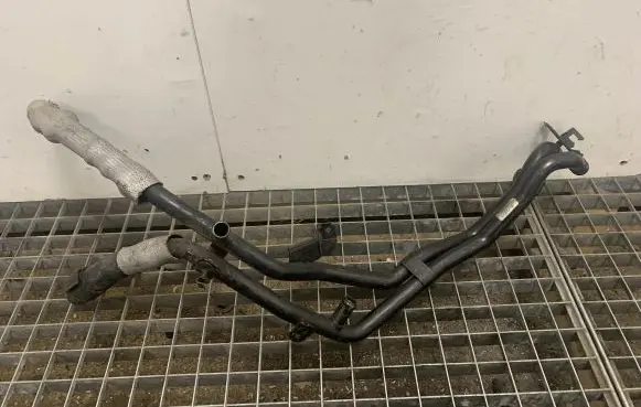 Volkswagen Touareg II Engine coolant pipe/hose 7P6121070AJ 7P6121065AA