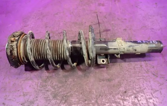 Skoda Fabia Mk2 (5J) Front shock absorber with coil spring 