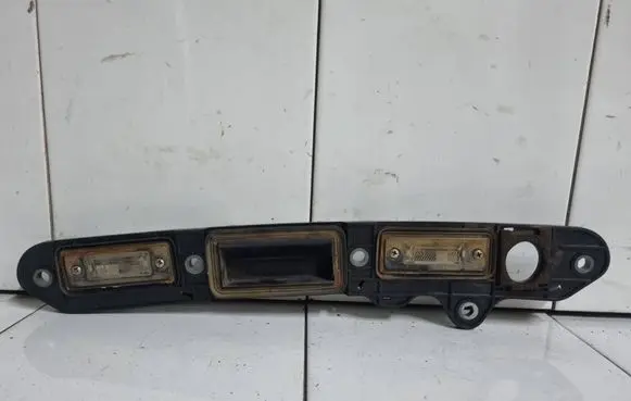 Volkswagen Jetta V Trunk door license plate light bar 1T0827574B