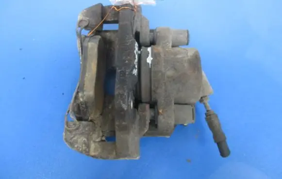 Mazda 323 F Front brake caliper