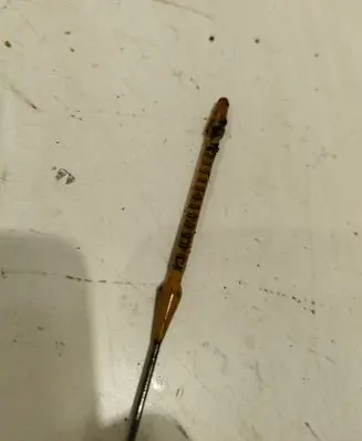 Oil level dip stick