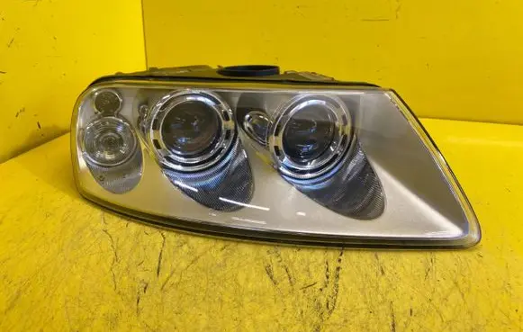 Volkswagen Touareg I Headlight/headlamp 7L6941016CF