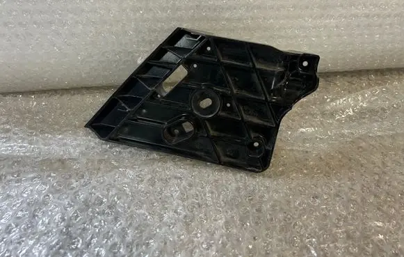 Nissan Qashqai Headlight/headlamp mounting bracket DHA661