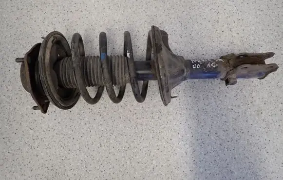 Front shock absorber with coil spring