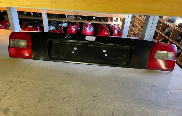Volvo S40, V40 Trunk door license plate light bar 291600