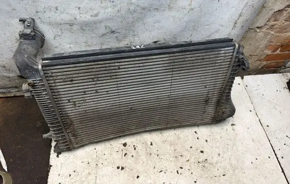 Volkswagen Golf V Intercooler radiator 1K0145928D