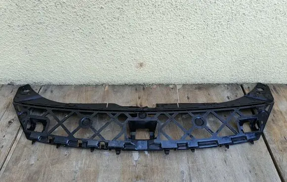 Engine bonnet/hood lock trim molding