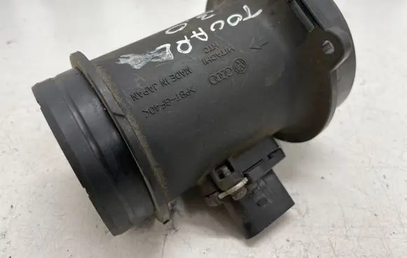 Volkswagen Touareg I Mass air flow meter 059906461K