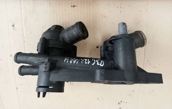 Thermostat/thermostat housing