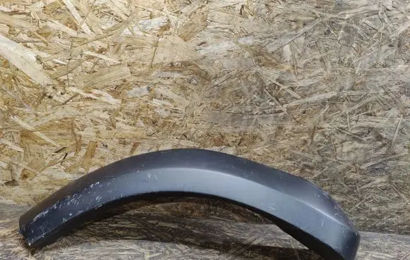 Volkswagen Touareg I Front arch trim 7L0800122