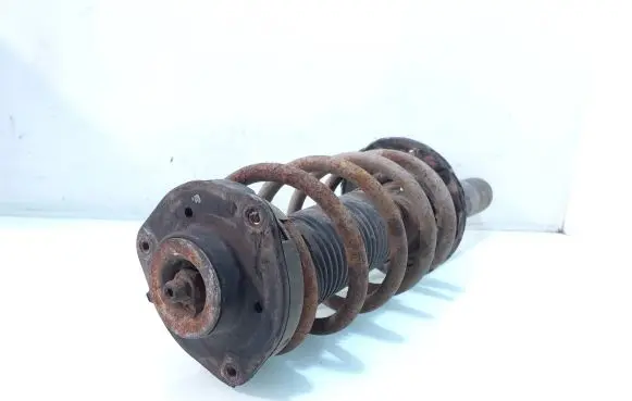 Volkswagen Touran II Front shock absorber with coil spring 335808