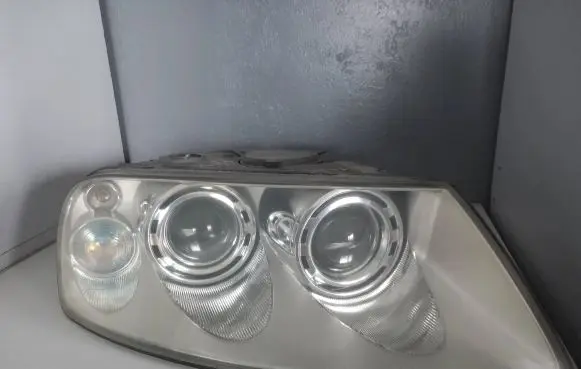 Volkswagen Touareg I Headlight/headlamp 7L6941016BK MADEINEU
