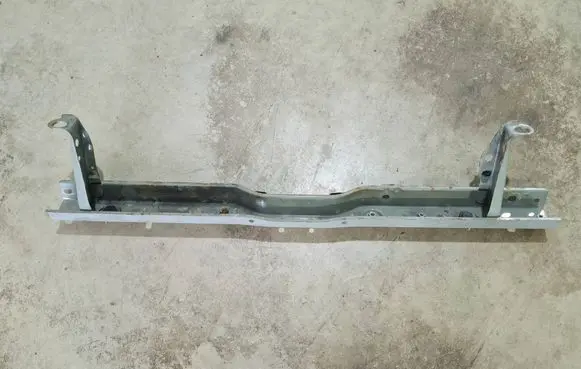 Top upper radiator support slam panel