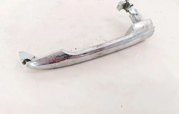 KIA Carens I Front door exterior handle