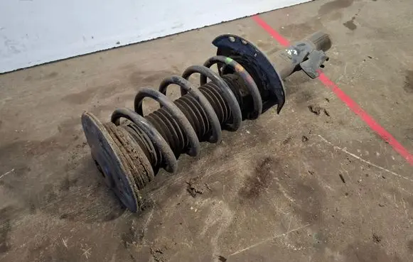 Volvo V60 Front shock absorber with coil spring 31323220