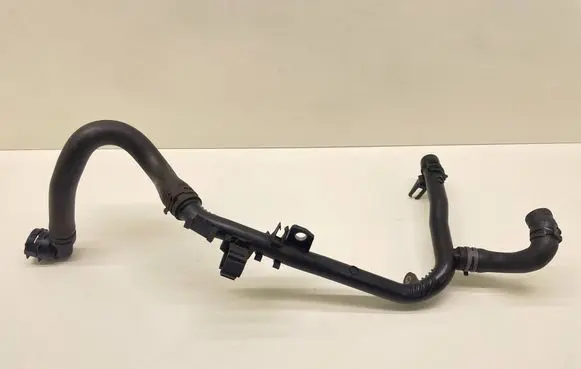 Volkswagen Touran II Engine coolant pipe/hose 03L121065AJ