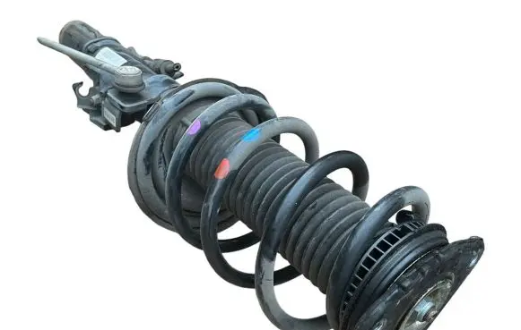 Front shock absorber with coil spring