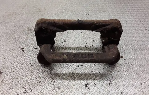Nissan X-Trail T30 Brake caliper pad carrier rear 
