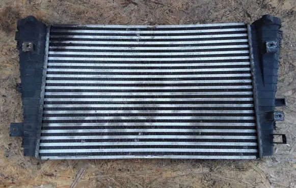 Opel Zafira B Intercooler radiator 13223395