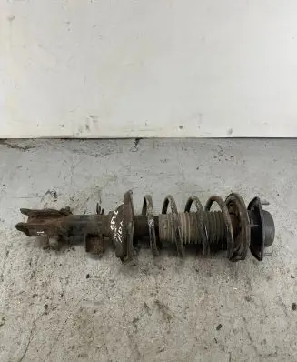 Front shock absorber with coil spring