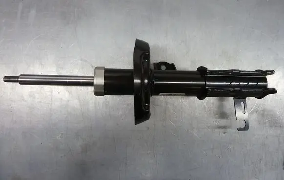 Opel Astra J Front shock absorber/damper 13412593