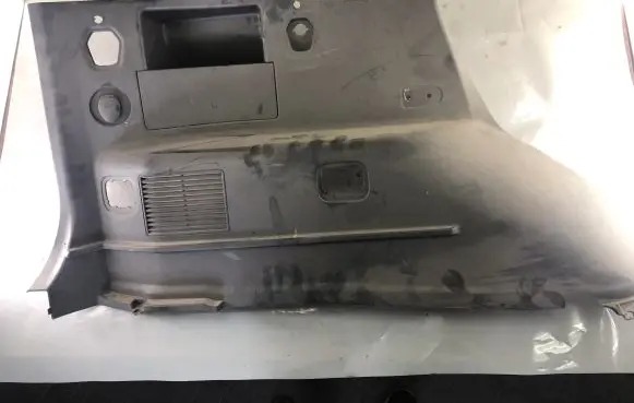 Trunk/boot lower side trim panel