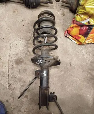 Suzuki Forenza Front shock absorber with coil spring 339029 KE1087