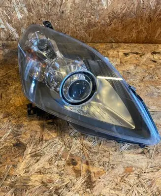 Opel Zafira B Headlight/headlamp 0301214282 13252471