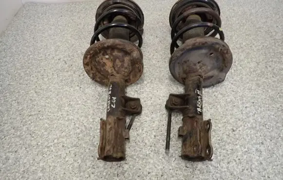 KIA Carens III Front shock absorber with coil spring 58920-1D350