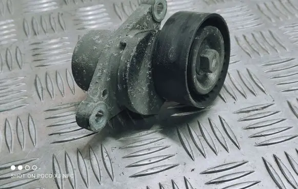Peugeot 308 Generator/alternator belt tensioner 9801875280