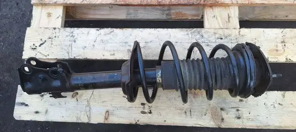 Toyota Yaris Front shock absorber with coil spring