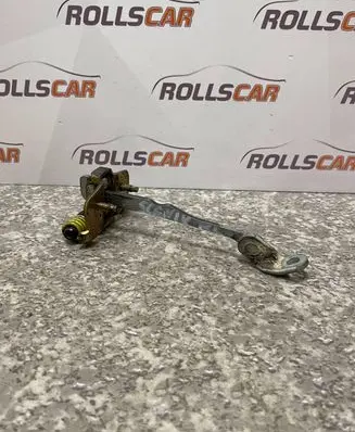 Rear door check strap stopper