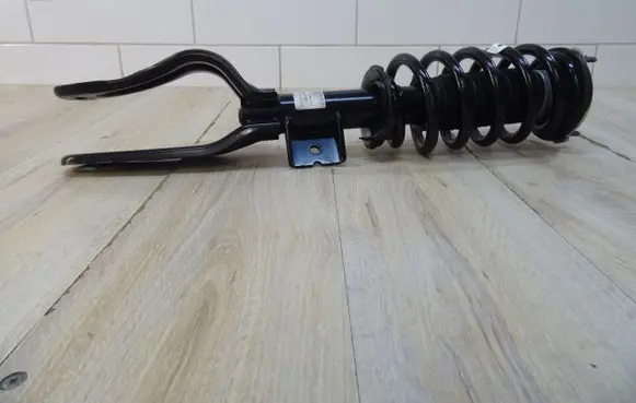 Tesla Model 3 Front shock absorber/damper 1288363-99-B