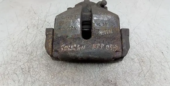 Volkswagen Touran I Front brake caliper 581