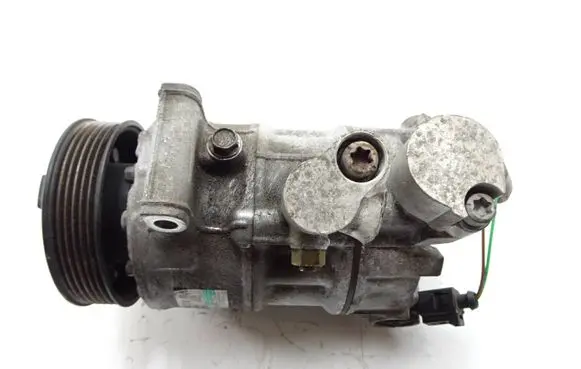 Volkswagen Golf VI Air conditioning (A/C) compressor (pump) 018236099B4 R134A1701P 5N0820803