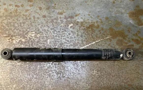 Volkswagen Caddy Rear shock absorber/damper 2212575 K4010265