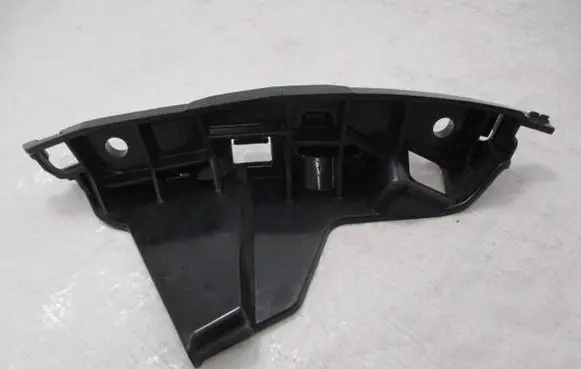Peugeot 208 I Front bumper mounting bracket 9823207880