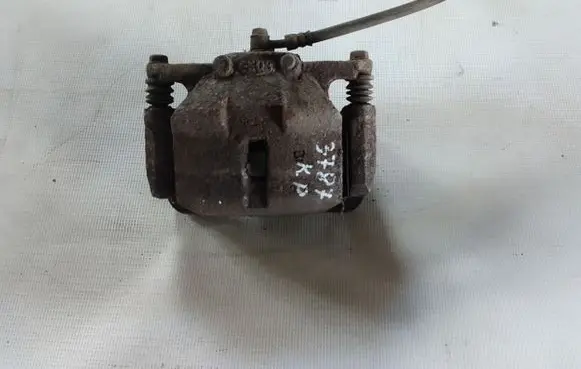Nissan Qashqai+2 Front brake caliper 41011JD00A