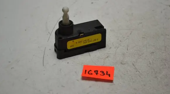 Volkswagen Touran I Headlight level adjustment motor 0307853304 1J0941295A
