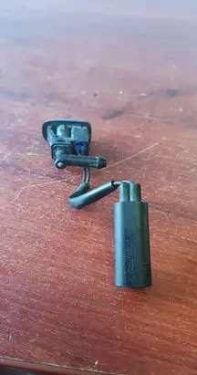 Windshield washer spray nozzle