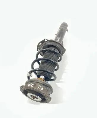 Volkswagen Golf VII Front shock absorber with coil spring 5Q0412037