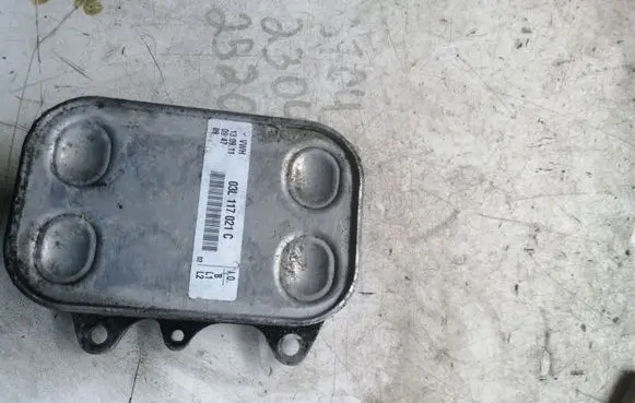 Volkswagen Golf VI Oil filter mounting bracket 03L117021C
