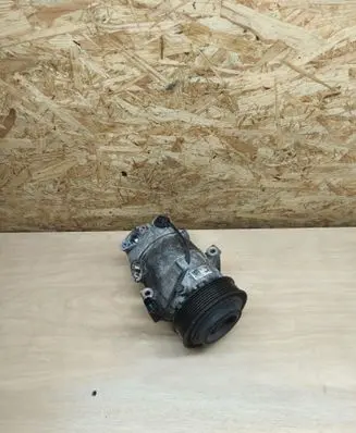 KIA Ceed Air conditioning (A/C) compressor (pump) 97701J7400