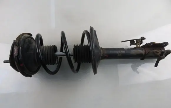 Front shock absorber with coil spring