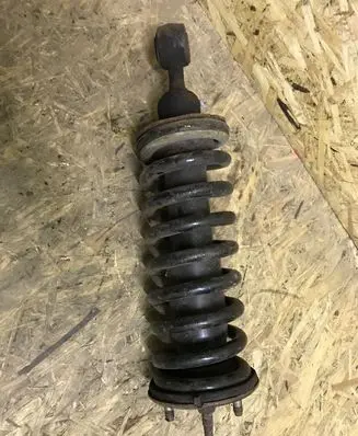 Nissan Navara D40 Front shock absorber with coil spring