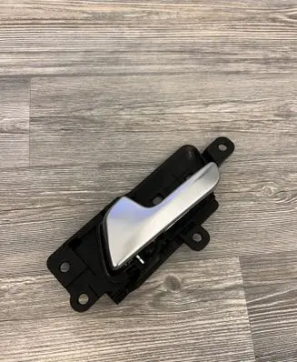 Rear door interior handle