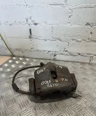 Volkswagen Golf VI Front brake caliper