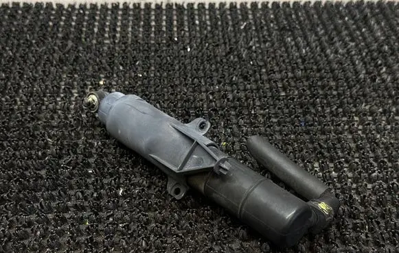 Headlight washer spray nozzle