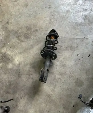 Opel Combo E Front shock absorber with coil spring
